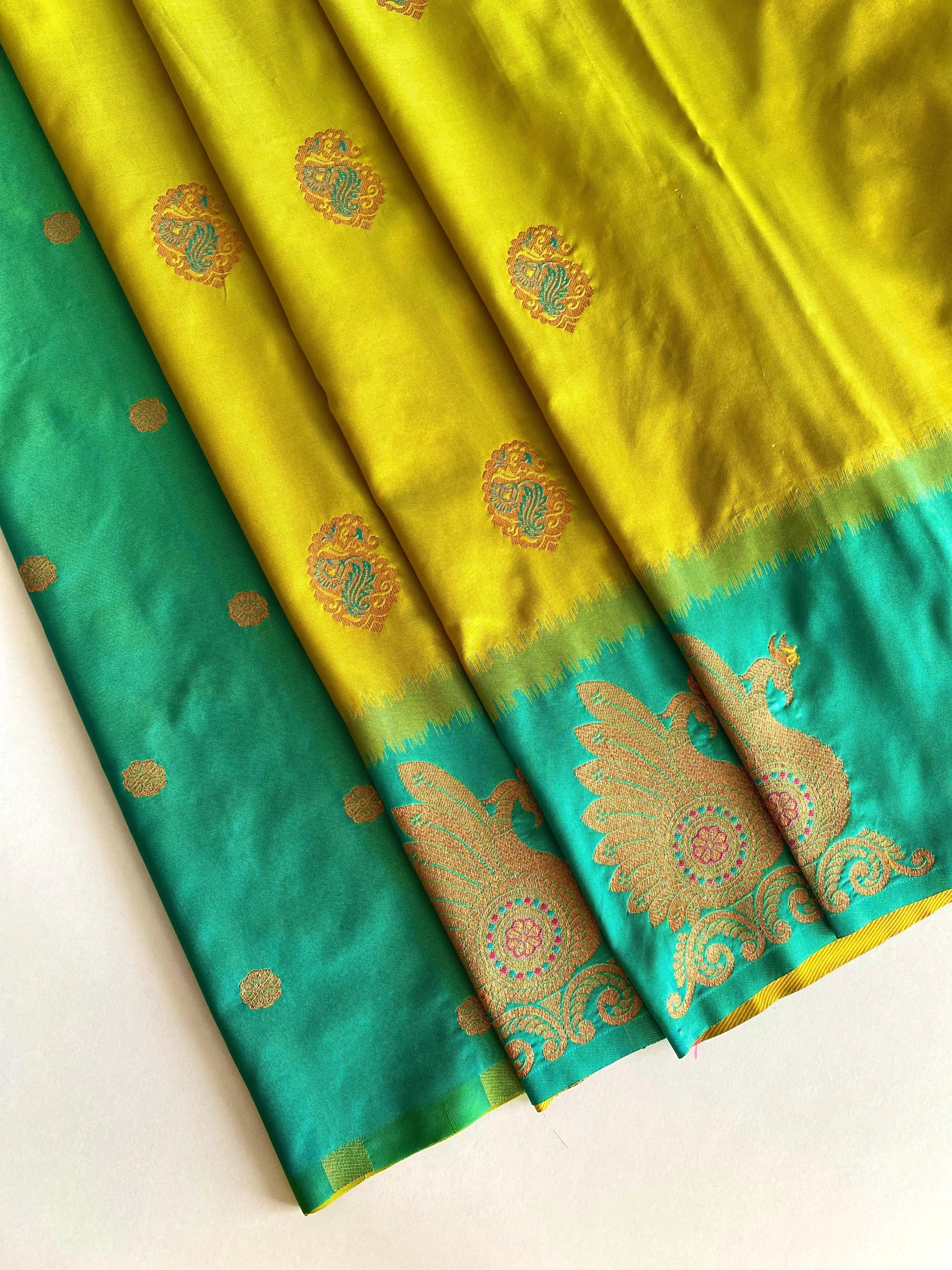 Dual Tone Unique Peacock Border Soft Silk Saree