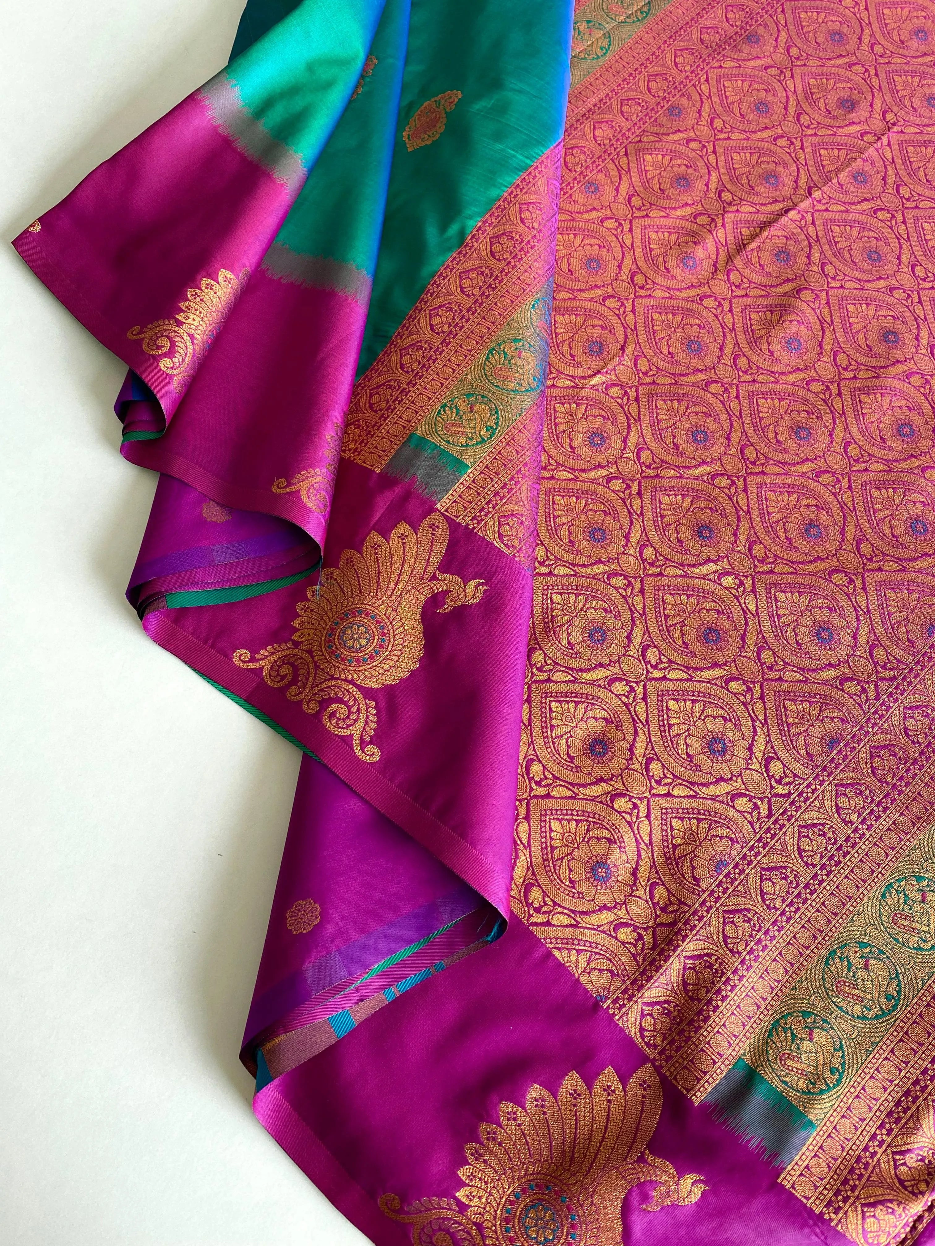 Dual Tone Unique Peacock Border Soft Silk Saree